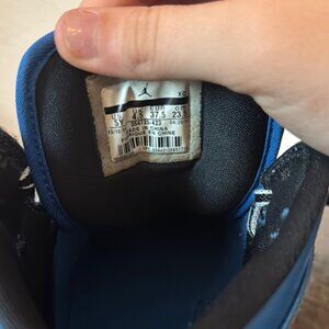 Blue and Black air Jordan sneakers